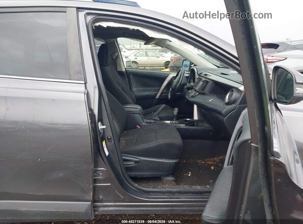 JTMWFREV6HJ149102 2017 TOYOTA RAV4 Gray Front interior view