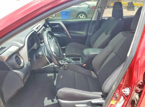 JTMWFREV6JD113317 2018 TOYOTA RAV4 Red Widok wnętrza z przodu