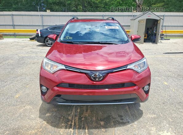 JTMWFREV6JD113317 2018 TOYOTA RAV4 Red Widok z przodu