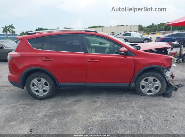 JTMWFREV7HJ121115 2017 TOYOTA RAV4 Red Vista interior trasera