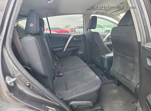 JTMWFREV7HJ123088 2017 TOYOTA RAV4 Gray Vista interior trasera