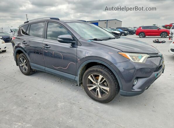JTMWFREV7HJ123088 2017 TOYOTA RAV4 Gray Delantero derecho