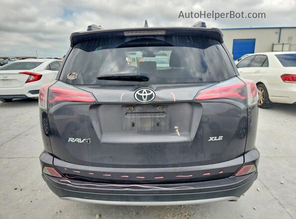 JTMWFREV7HJ123088 2017 TOYOTA RAV4 Gray Vista trasera