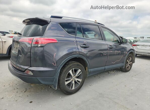 JTMWFREV7HJ123088 2017 TOYOTA RAV4 Gray Trasero derecho