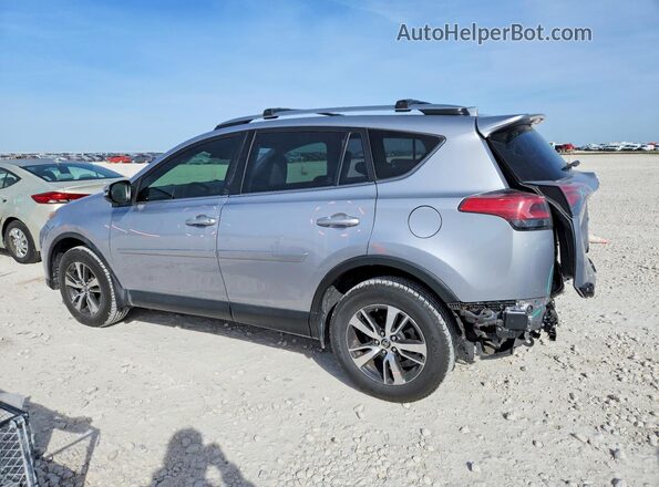 JTMWFREV7JD126299 2018 TOYOTA RAV4 Silver Հետևի ձախ