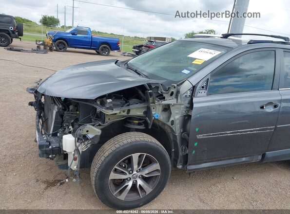 JTMWFREV8GD091796 2016 TOYOTA RAV4 Gray Widok z przodu