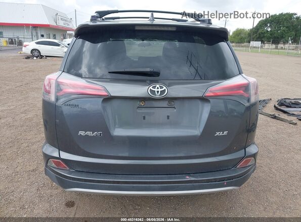 JTMWFREV8GD091796 2016 TOYOTA RAV4 Gray 