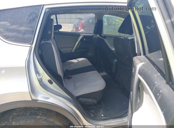 JTMWFREV8JJ177375 2018 TOYOTA RAV4 Gray VIN sticker view
