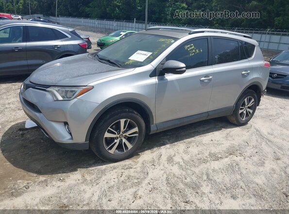 JTMWFREV8JJ177375 2018 TOYOTA RAV4 Gray Front left