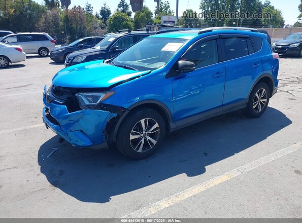 JTMWFREV9GD092052 2016 TOYOTA RAV4 Blue Առջևի ձախ երեք քառորդ տեսարան