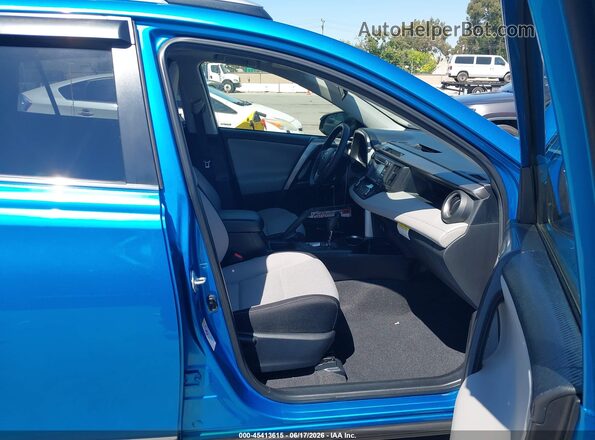 JTMWFREV9GD092052 2016 TOYOTA RAV4 Blue Սալոնի դիմացի տեսք