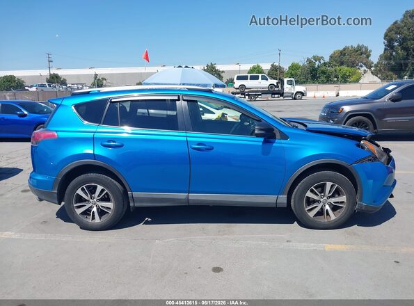 JTMWFREV9GD092052 2016 TOYOTA RAV4 Blue Սալոնի հետևի տեսք