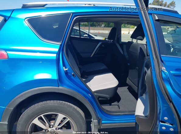 JTMWFREV9GD092052 2016 TOYOTA RAV4 Blue VIN կոդի պիտակի տեսք