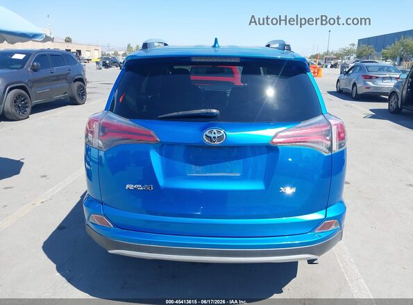 JTMWFREV9GD092052 2016 TOYOTA RAV4 Blue 