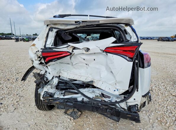 JTMWFREV9HD105657 2017 TOYOTA RAV4 White Հետևի տեսք