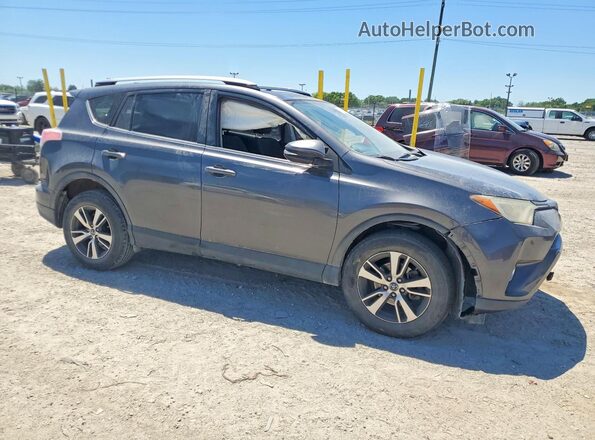 JTMWFREV9HJ113632 2017 TOYOTA RAV4 Gray Front right