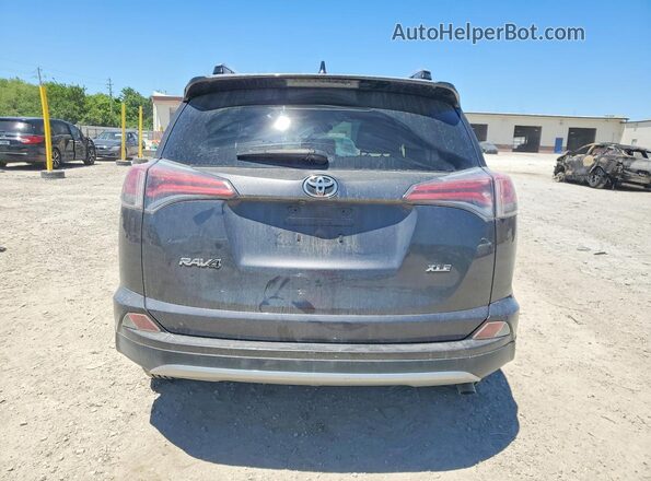 JTMWFREV9HJ113632 2017 TOYOTA RAV4 Gray Rear view