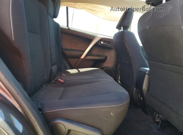 JTMWFREV9HJ113632 2017 TOYOTA RAV4 Gray Rear interior view
