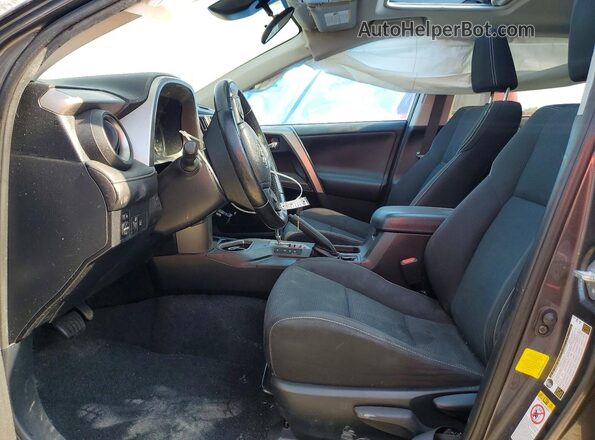 JTMWFREV9HJ113632 2017 TOYOTA RAV4 Gray Front interior view