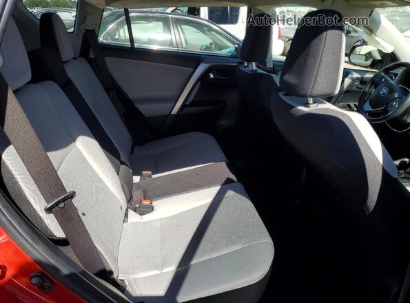 JTMWFREV9HJ131404 2017 TOYOTA RAV4 Red Rear interior view