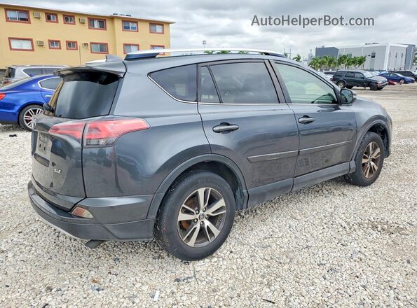 JTMWFREVXGD083019 2016 TOYOTA RAV4 Gray 
