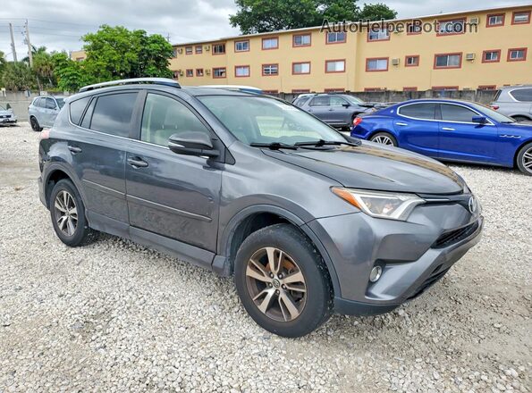JTMWFREVXGD083019 2016 TOYOTA RAV4 Gray 