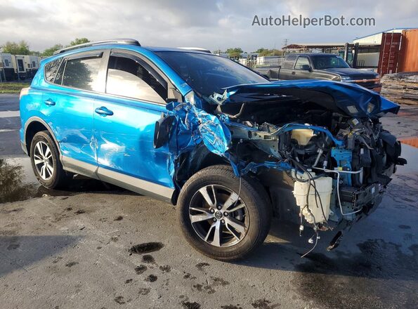 JTMWFREVXHD095219 2017 TOYOTA RAV4 Blue Delantero derecho