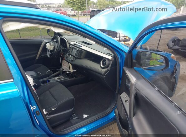 JTMWFREVXHJ700146 2017 TOYOTA RAV4 Blue Front interior view