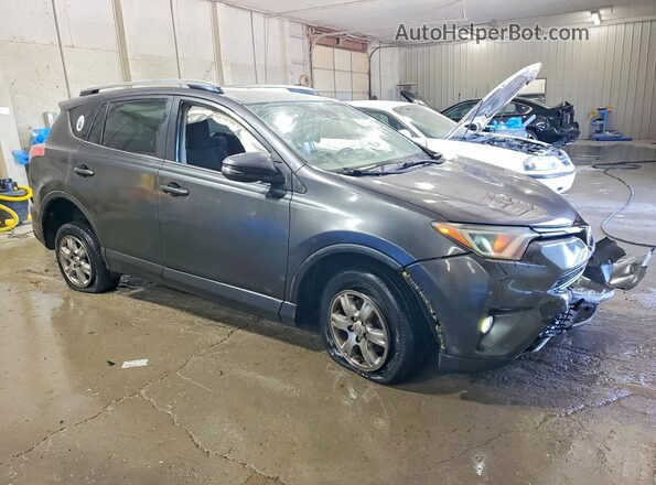 JTMWFREVXHJ700177 2017 TOYOTA RAV4 Gray Front right