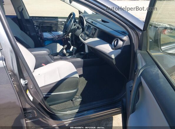 JTMWFREVXJD132338 2018 TOYOTA RAV4 Gray Vista interior delantera