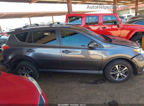 JTMWFREVXJJ167494 2018 TOYOTA RAV4 Gray უკანა სალონის ხედი