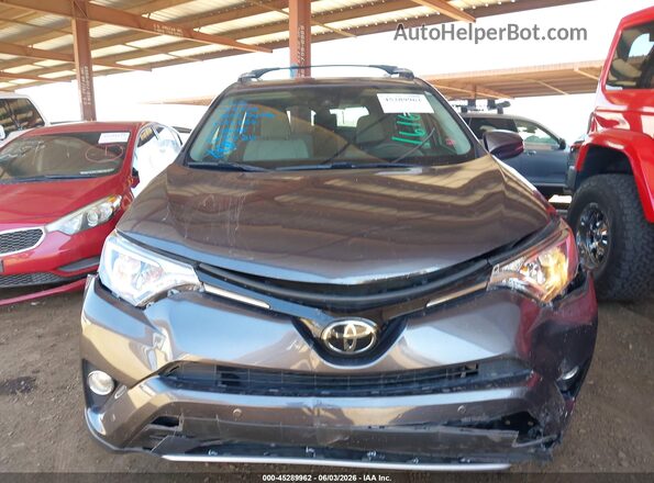 JTMWFREVXJJ167494 2018 TOYOTA RAV4 Gray ხელსაწყოთა პანელის ხედი