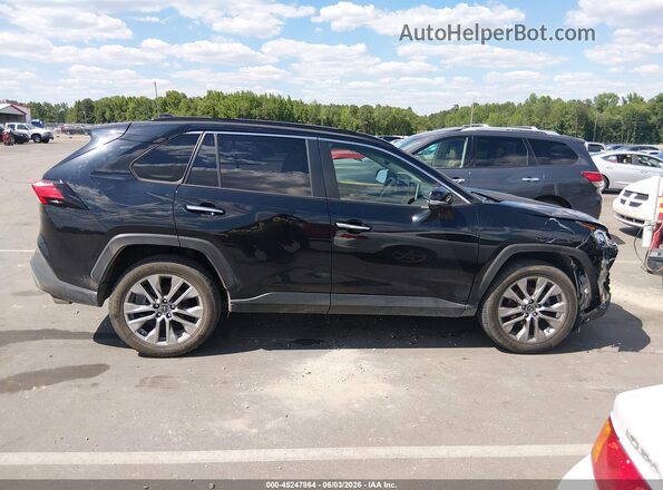 JTMY1RFV6KD512915 2019 TOYOTA RAV4 Black Вид задньої частини салону
