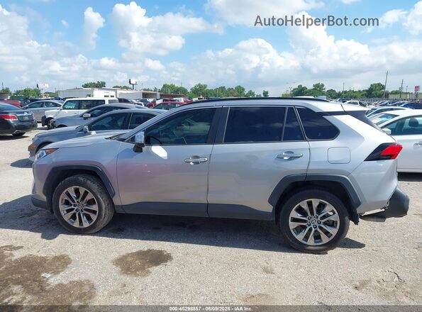JTMY1RFV9MD064379 2021 TOYOTA RAV4 Gray Vista interior trasera