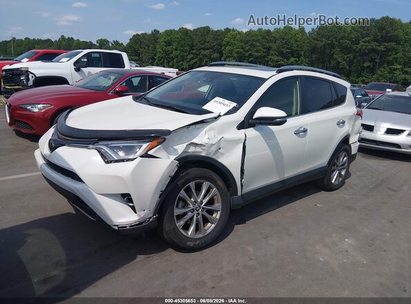 JTMYFREV0JD114083 2018 TOYOTA RAV4 White Front left