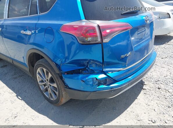 JTMYFREV1JJ205428 2018 TOYOTA RAV4 Blue Вид спереду