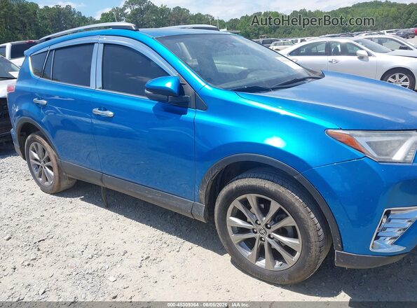 JTMYFREV1JJ205428 2018 TOYOTA RAV4 Blue Вид задньої частини салону