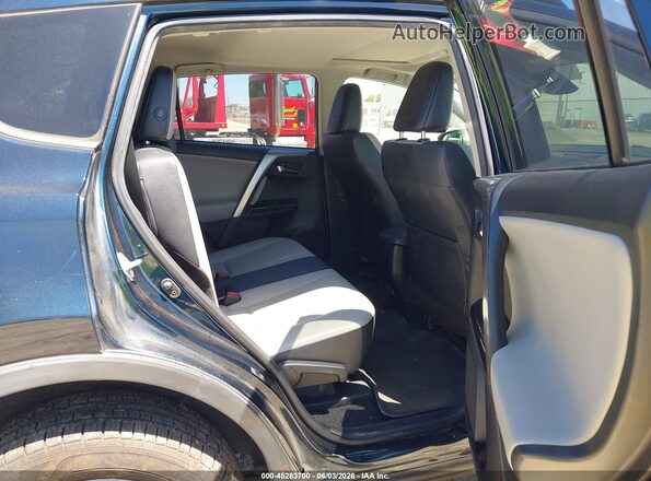 JTMYFREV2JD131192 2018 TOYOTA RAV4 Blue Widok naklejki z numerem VIN