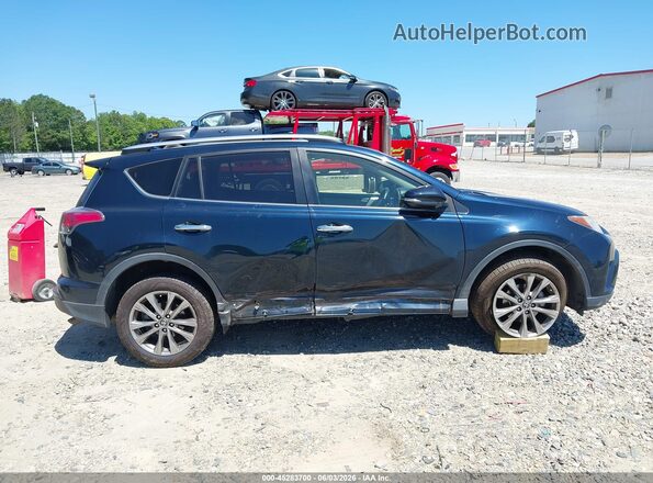 JTMYFREV2JD131192 2018 TOYOTA RAV4 Blue Widok wnętrza z tyłu