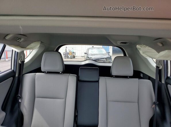 JTMYFREV2JJ205955 2018 TOYOTA RAV4 White Vista de los asientos traseros
