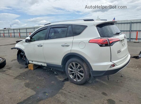 JTMYFREV2JJ205955 2018 TOYOTA RAV4 White Trasero izquierdo