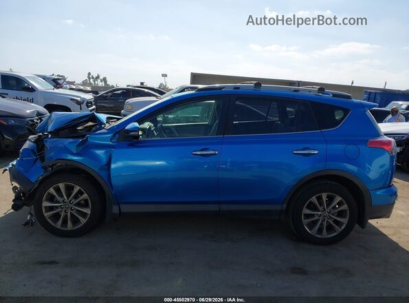 JTMYFREV3HJ704905 2017 TOYOTA RAV4 Синий Вид задней части салона