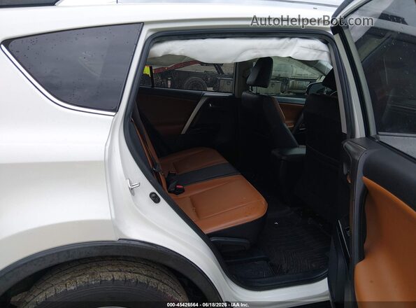 JTMYFREV9JJ191357 2018 TOYOTA RAV4 White Вид наклейки з VIN-кодом