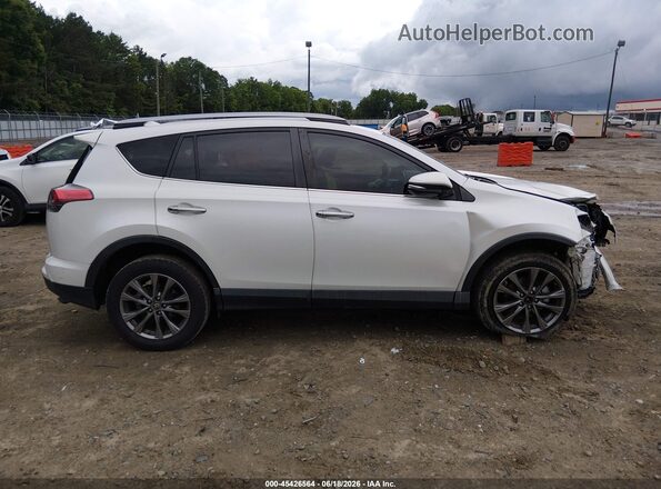 JTMYFREV9JJ191357 2018 TOYOTA RAV4 White Вид задньої частини салону