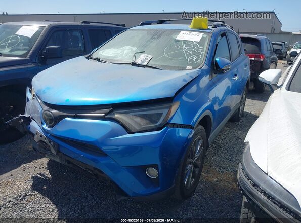 JTMYFREV9JJ725957 2018 TOYOTA RAV4 Blue Front left