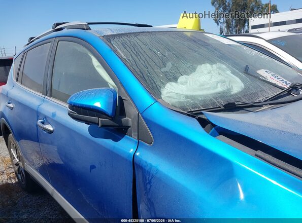 JTMYFREV9JJ725957 2018 TOYOTA RAV4 Blue 360 interior view