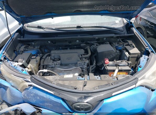 JTMYFREV9JJ725957 2018 TOYOTA RAV4 Blue Rear view