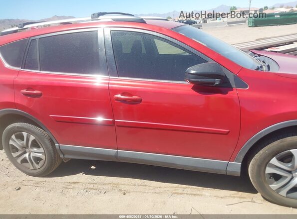 JTMZFREV0HJ127898 2017 TOYOTA RAV4 Red Rear interior view