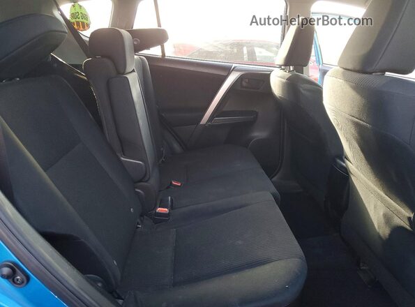 JTMZFREV0HJ132096 2017 TOYOTA RAV4 Blue Rear seats view