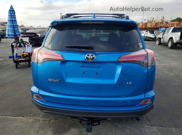 JTMZFREV0HJ132096 2017 TOYOTA RAV4 Blue Rear view